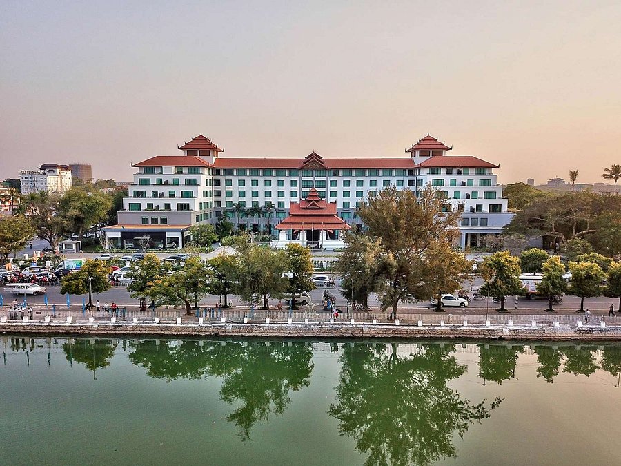 Night view of Hilton Mandalay with the illuminated Royal Palace walls in the background